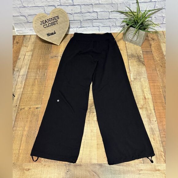 Lululemon Sit In Stillness Pant
Black wide leg drawstring bottom ankles size 10 - Picture 9 of 16